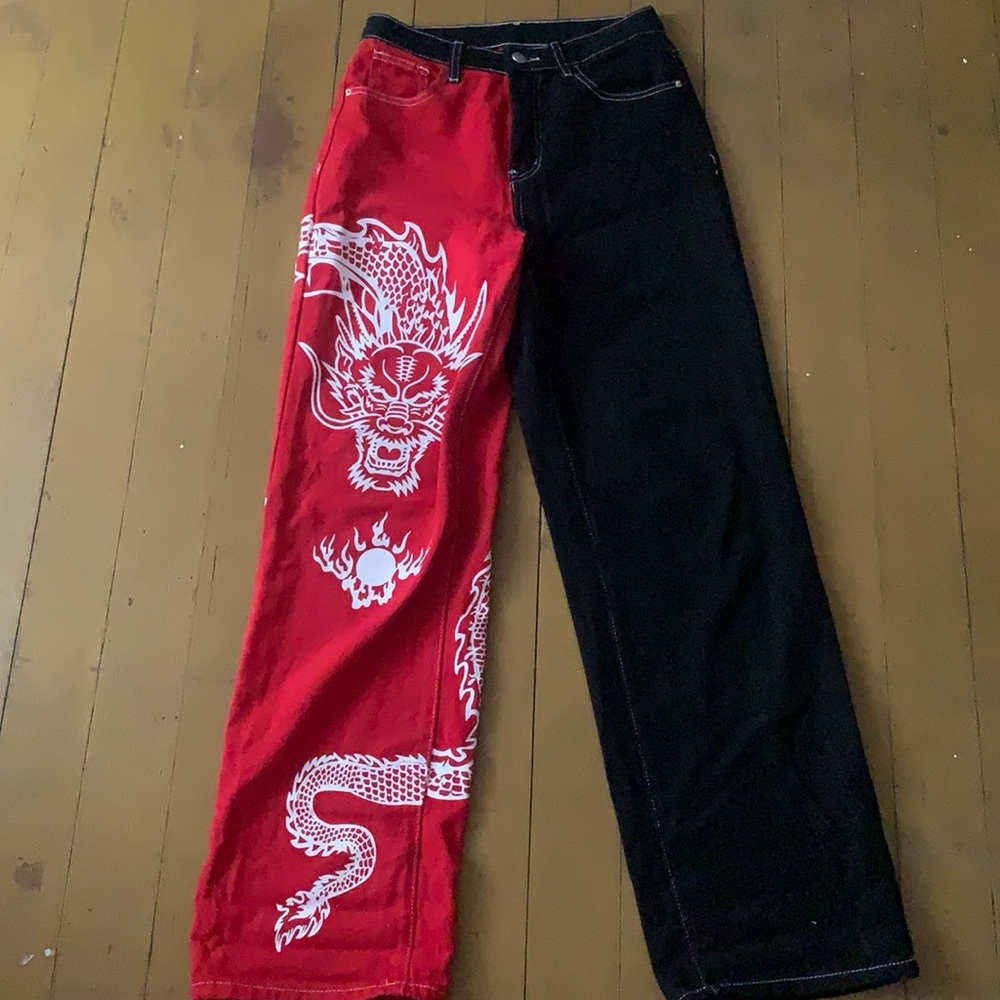 split colour dragon print jeans